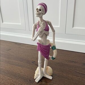 Skeleton Beach Decor with Purple Accents Halloween